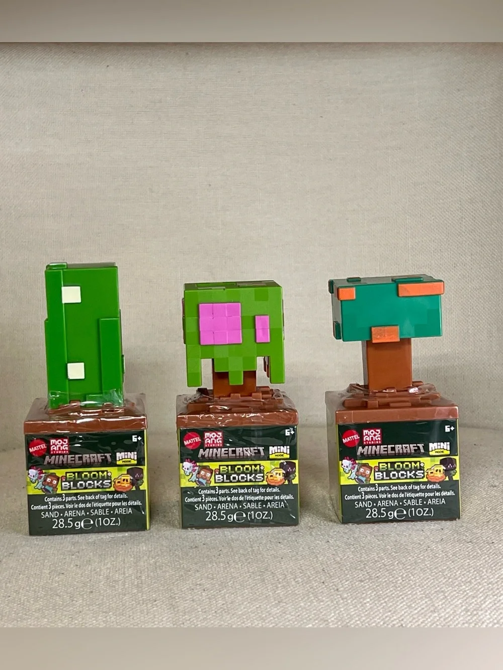 Mattel Minecraft Bloom Blocks Mini Figures in Bright Green, Brown, Teal, Pink